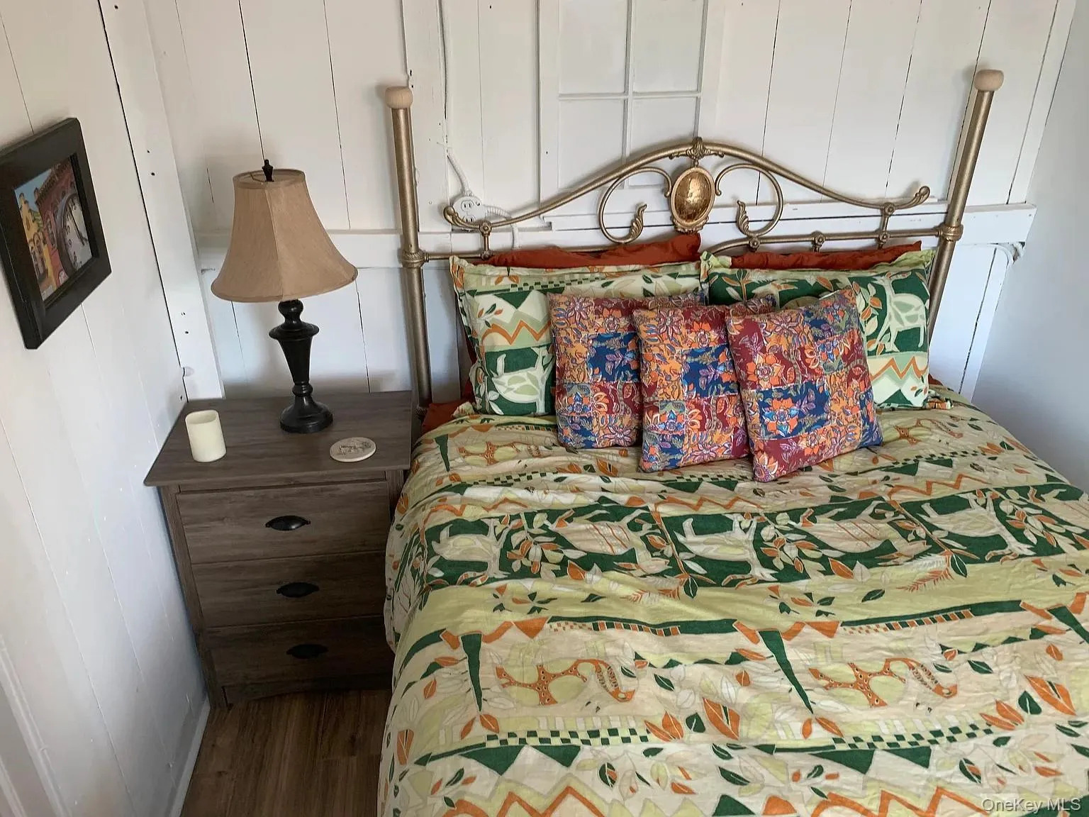 Bedroom with wooden walls and wood finished floors Bedroom with wooden walls and wood finished floors