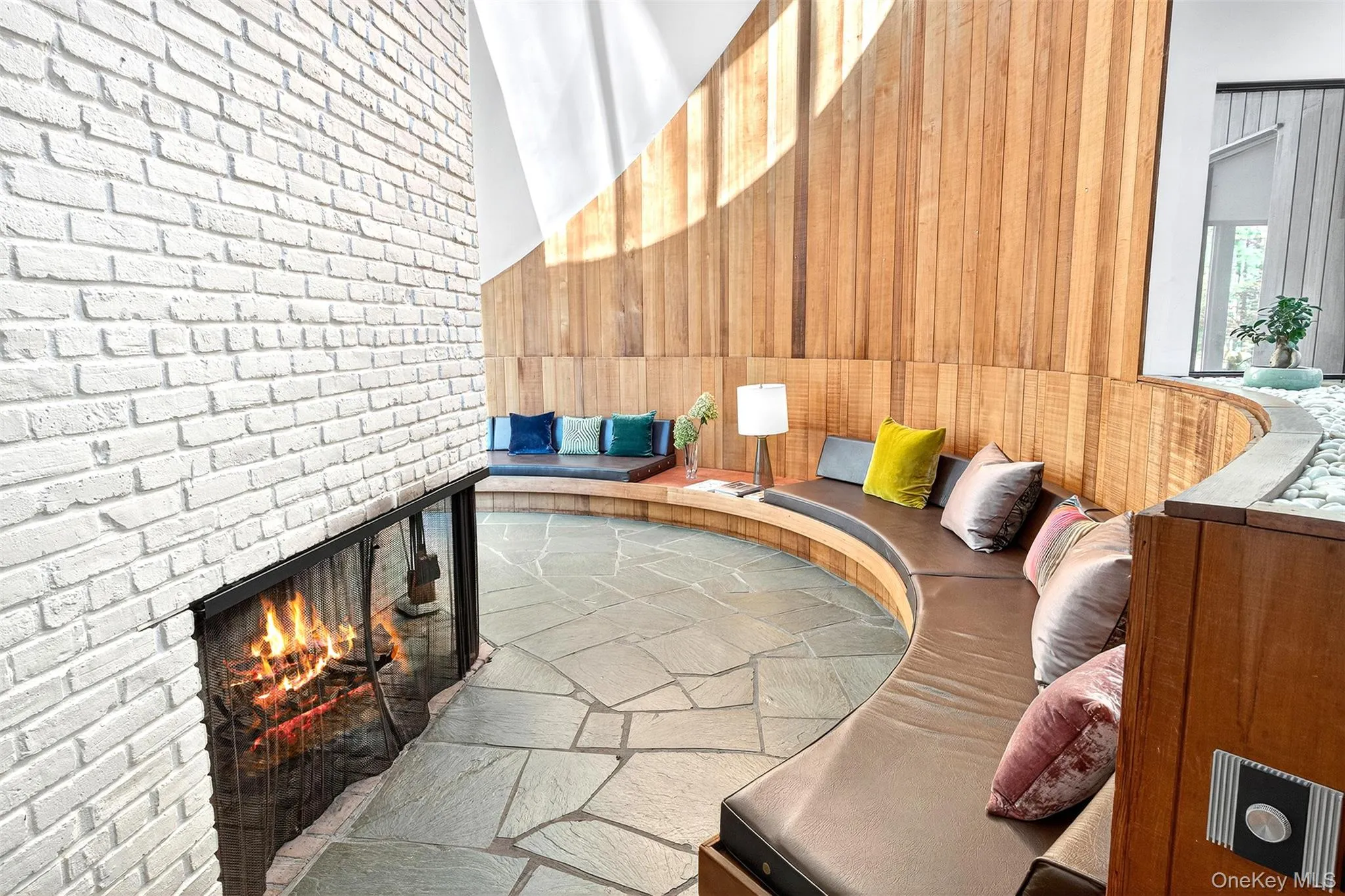 Sunken LR fireplace seating area. Sunken LR fireplace seating area.