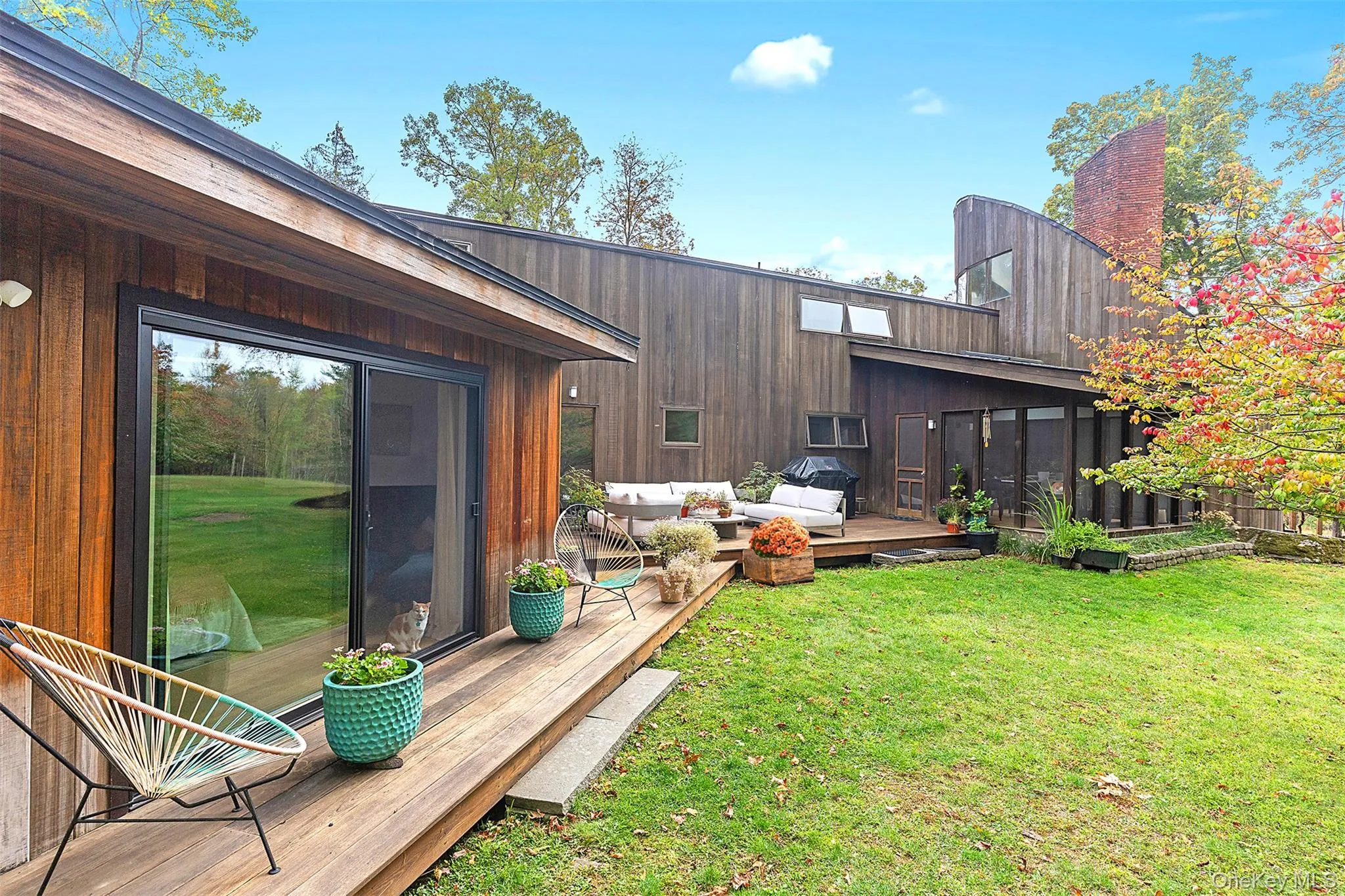 Deck and screened sunroom. Deck and screened sunroom.