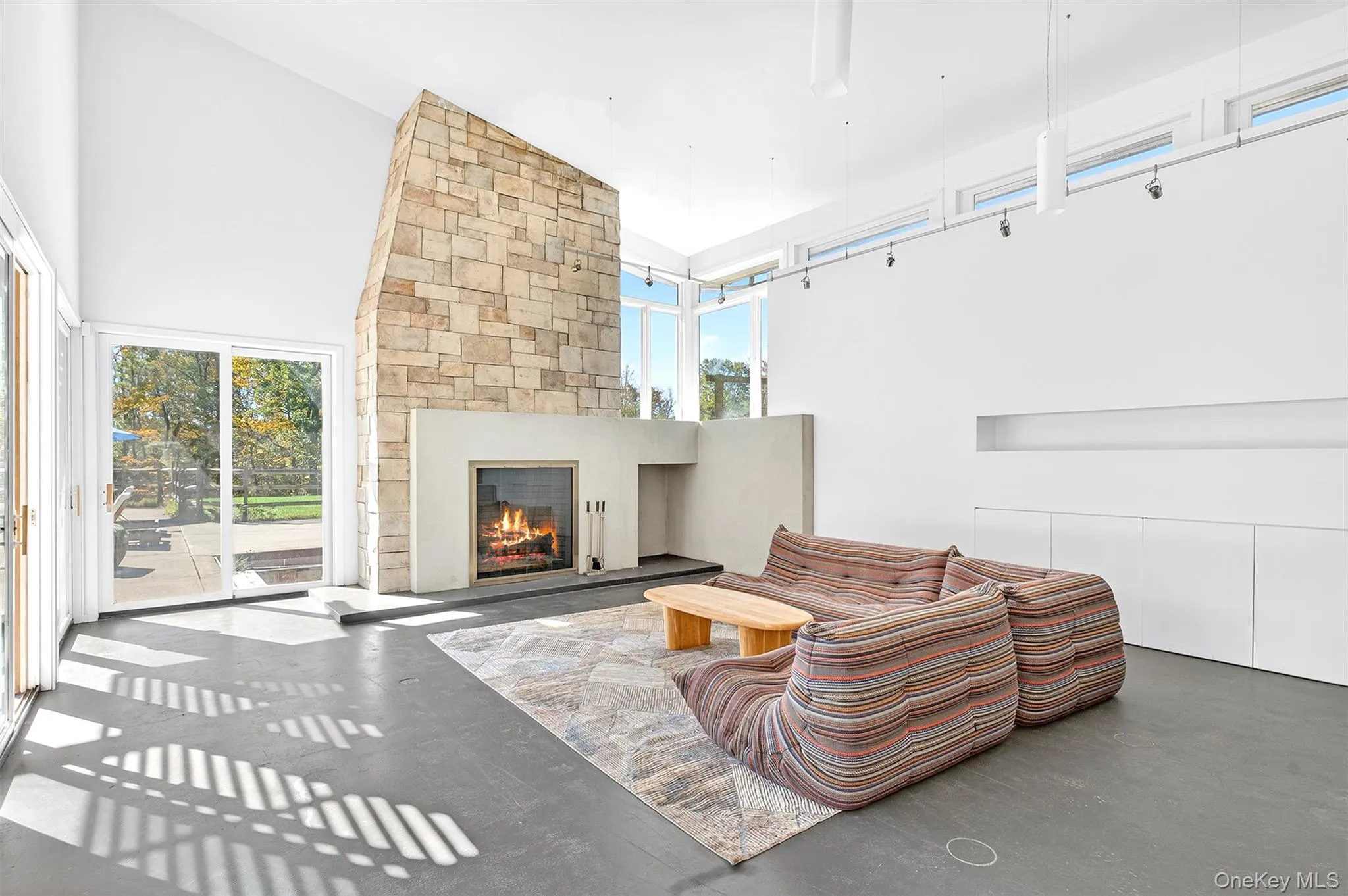 Pool/guest house LR with fireplace. Pool/guest house LR with fireplace.