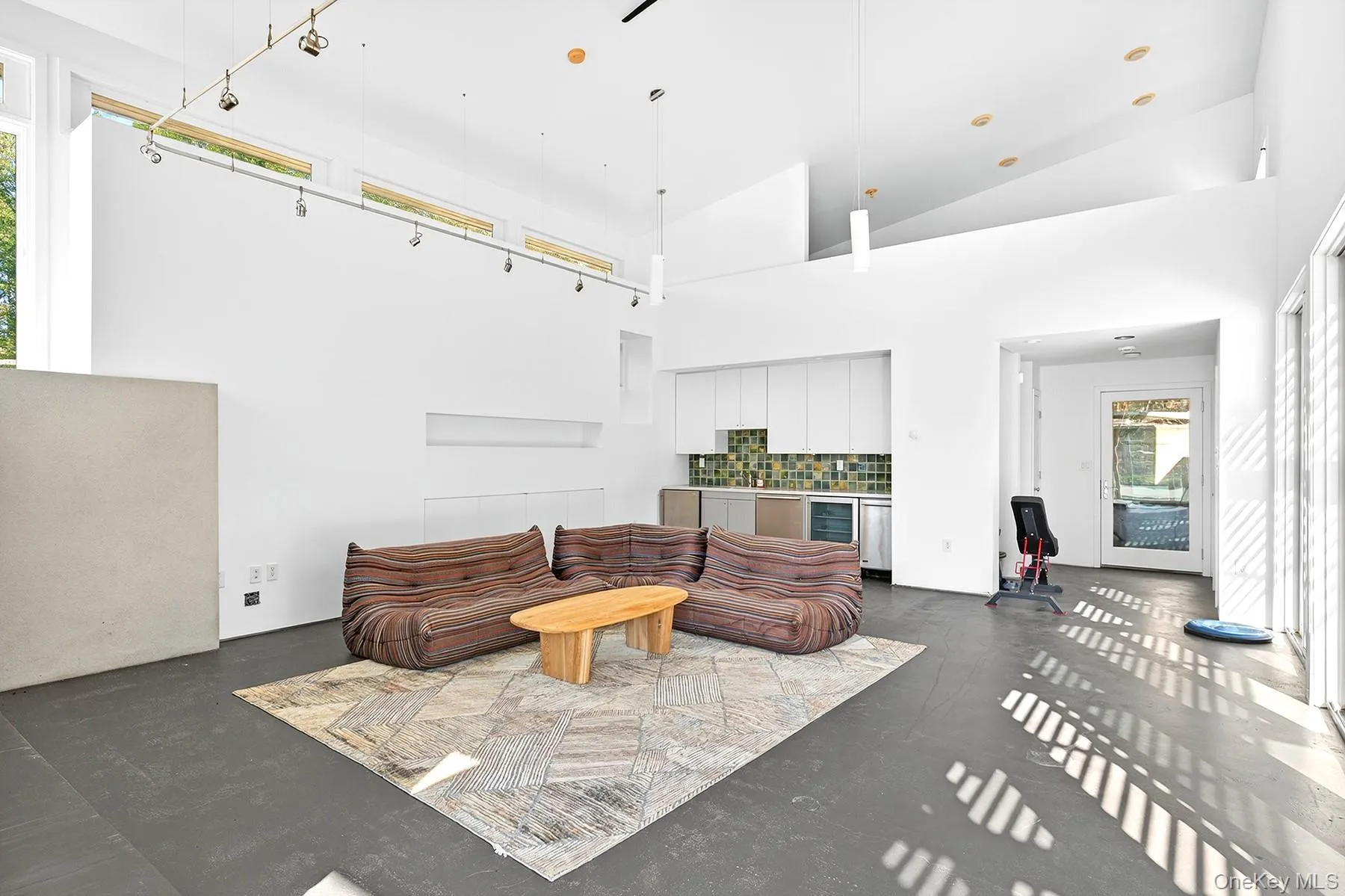 Pool/guest house LR with kitchen. Pool/guest house LR with kitchen.
