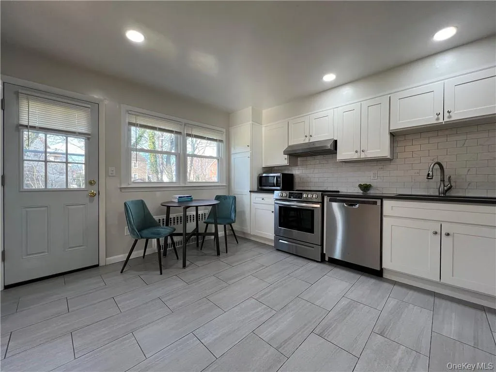 Kitchen w/ access to backyard Kitchen w/ access to backyard