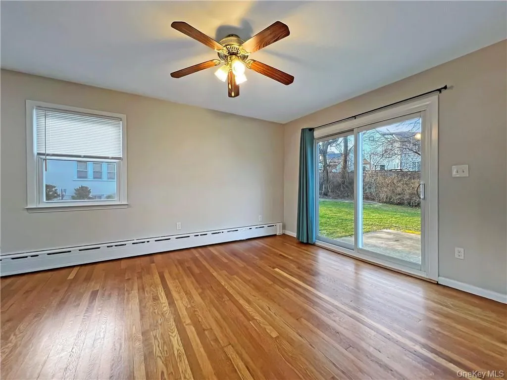 Dining Room w/ sliding doors to spacious backyard Dining Room w/ sliding doors to spacious backyard