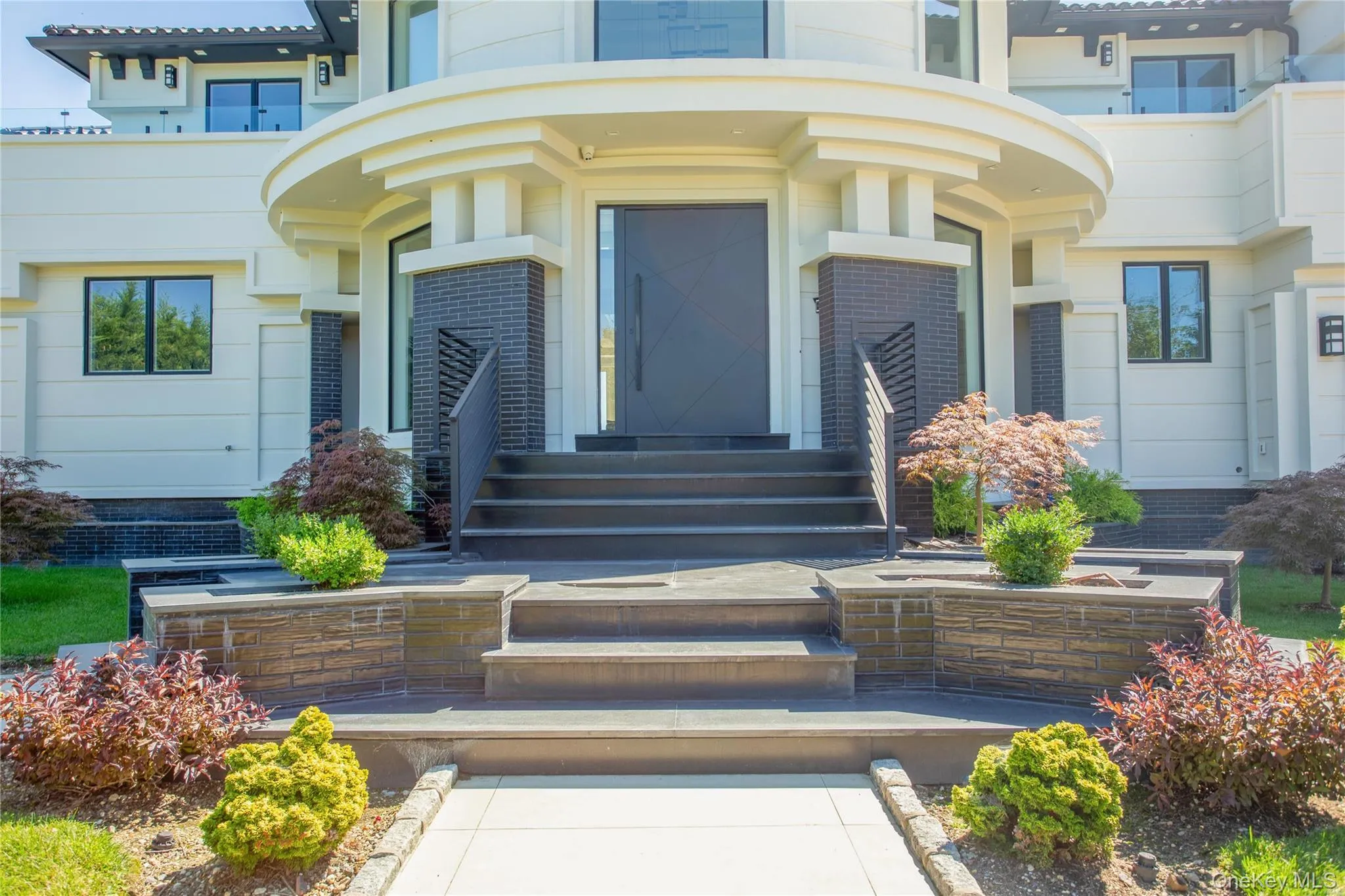 Property entrance featuring brick siding Property entrance featuring brick siding