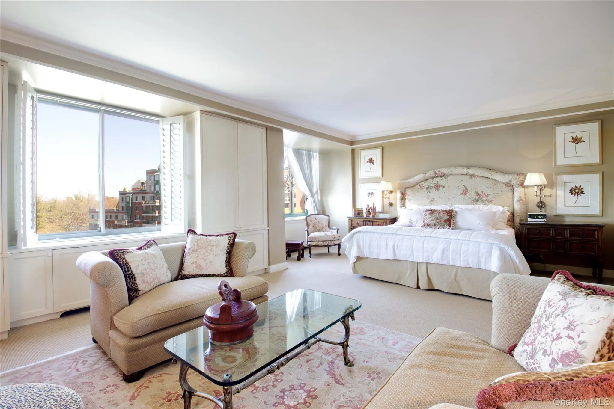 Carpeted bedroom featuring crown molding Carpeted bedroom featuring crown molding