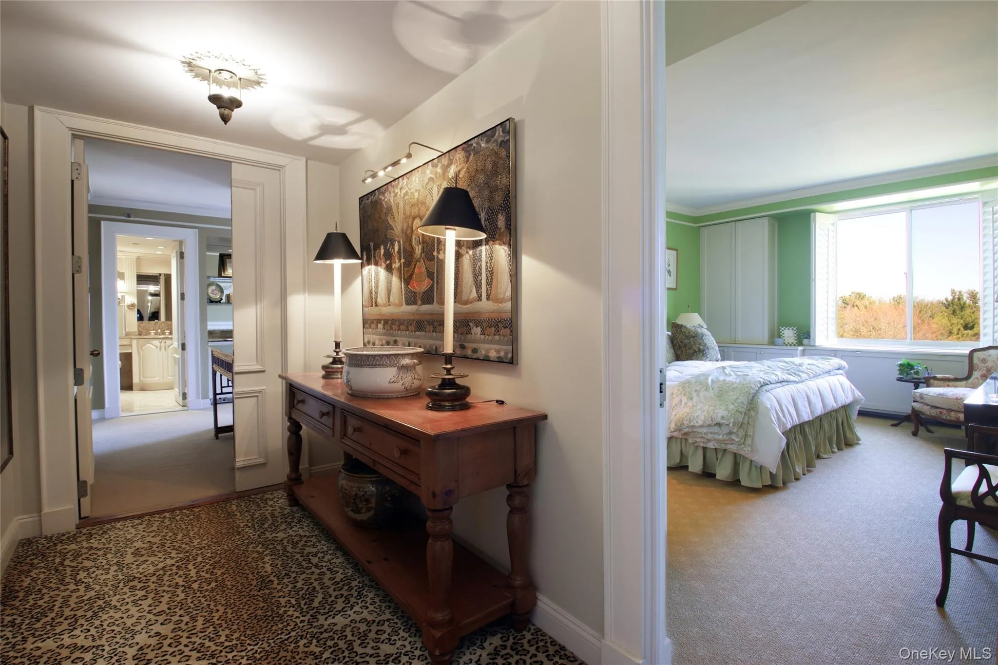 Hallway with carpet and baseboards Hallway with carpet and baseboards