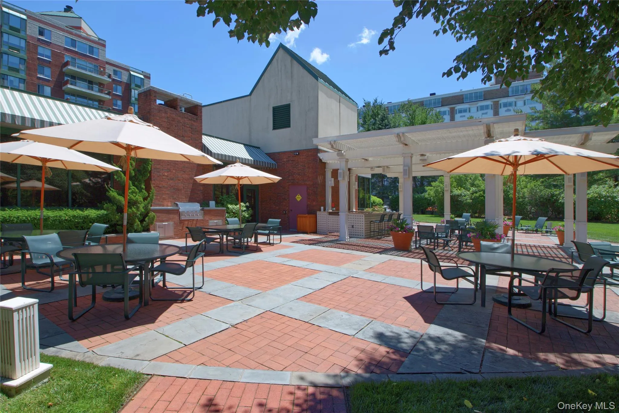 View of patio / terrace featuring outdoor dining area, a pergola, and area for grilling View of patio / terrace featuring outdoor dining area, a pergola, and area for grilling