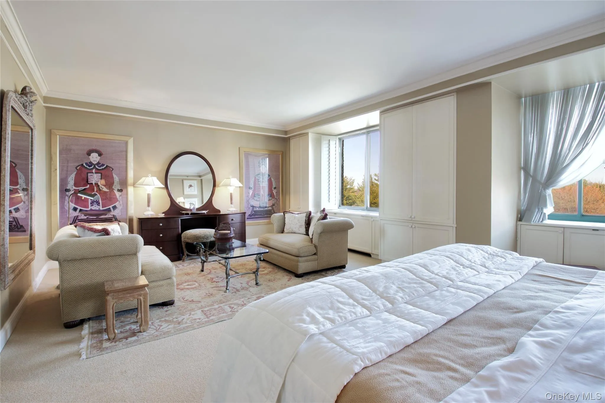 Bedroom featuring ornamental molding and carpet floors Bedroom featuring ornamental molding and carpet floors
