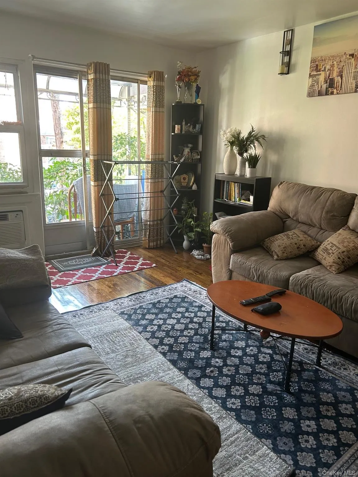 Living room featuring wood finished floors Living room featuring wood finished floors