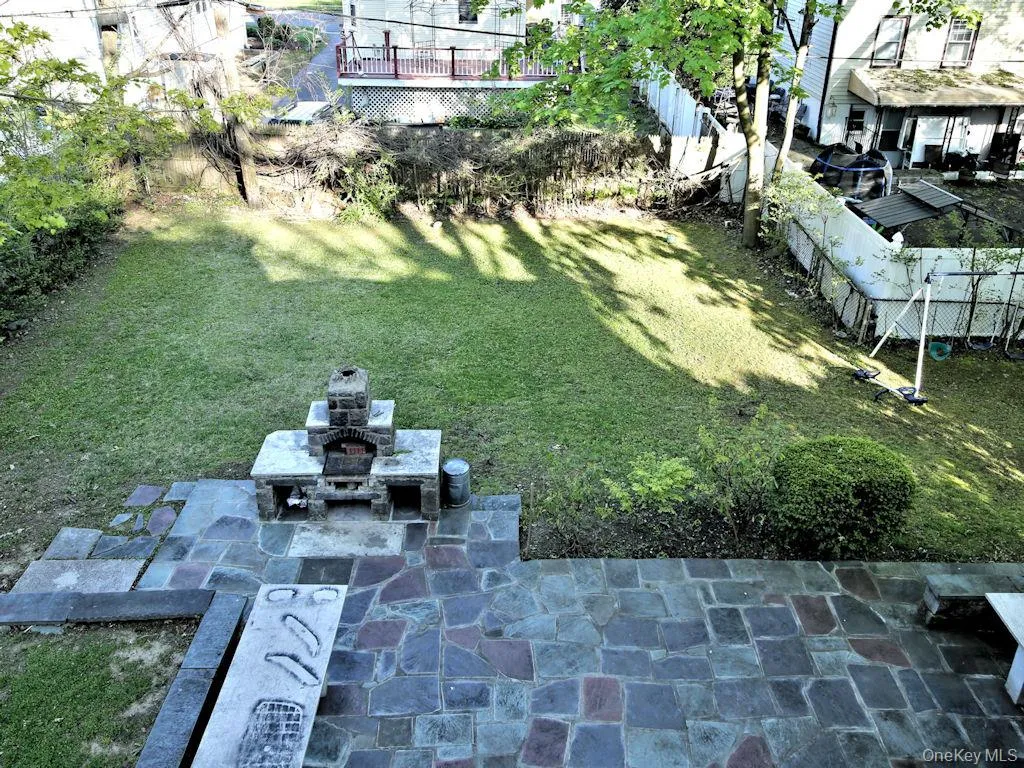 View of yard featuring a patio area View of yard featuring a patio area