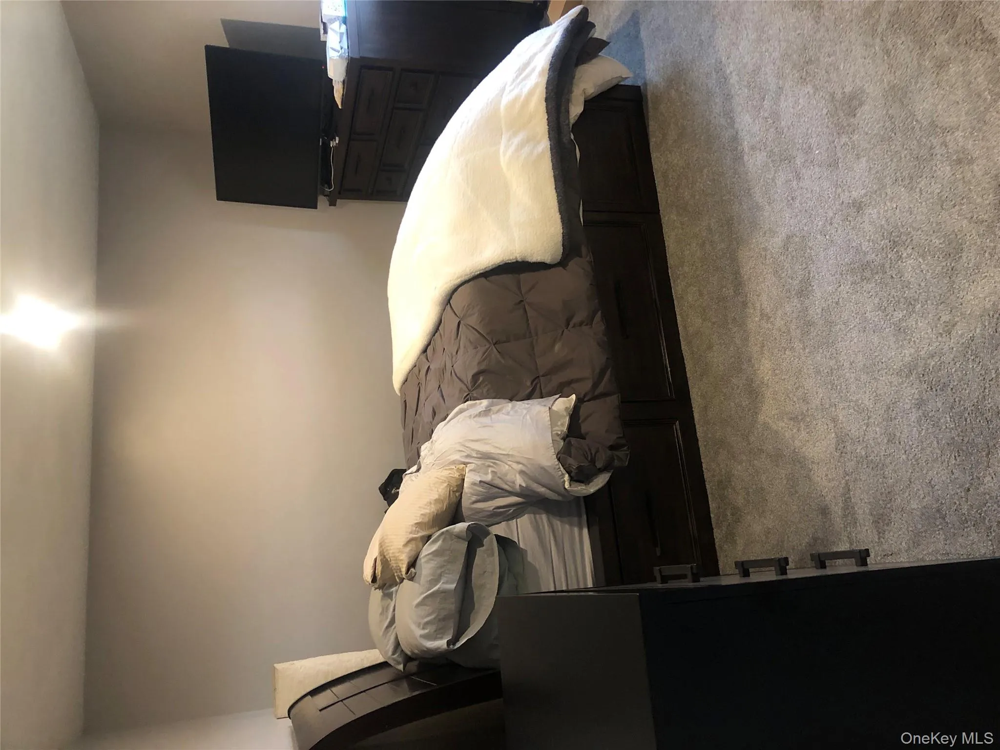 Bedroom with light carpet Bedroom with light carpet