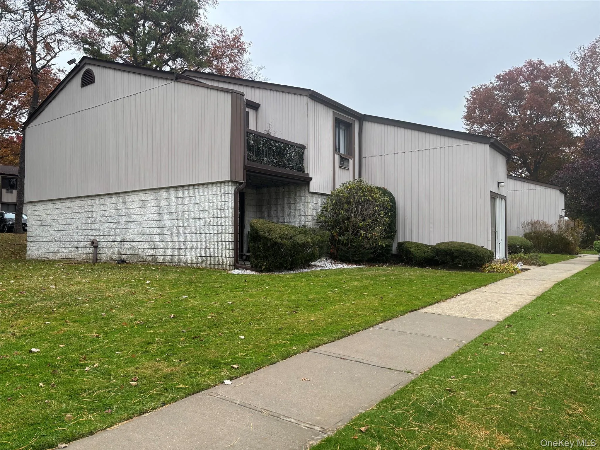 View of home's exterior with a lawn View of home's exterior with a lawn