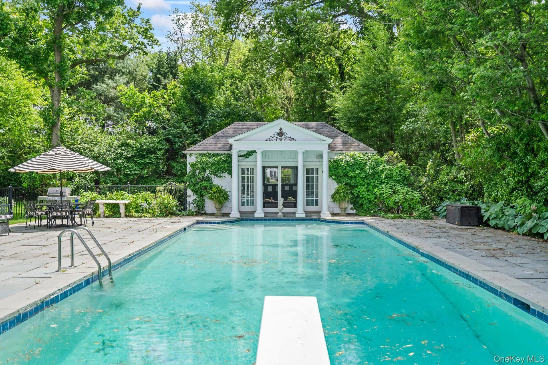 View of pool and pool house View of pool and pool house