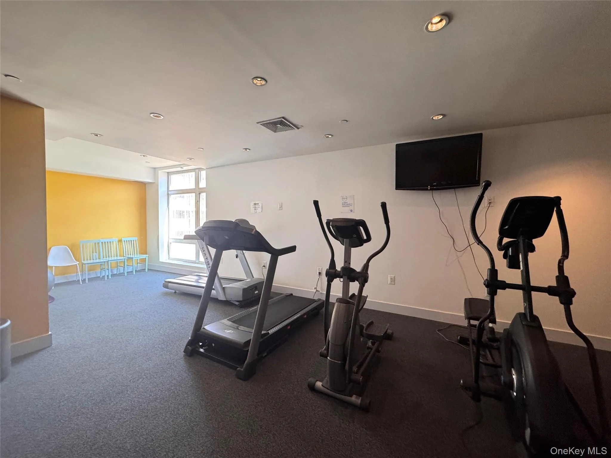 Exercise area featuring recessed lighting Exercise area featuring recessed lighting