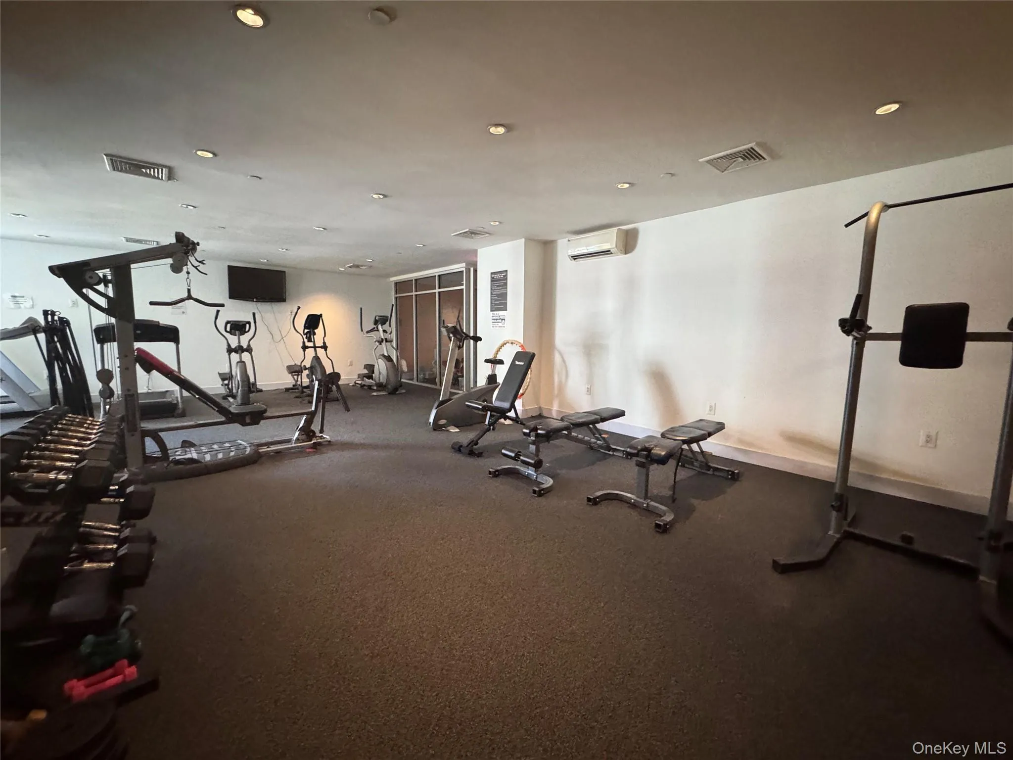 Exercise room featuring recessed lighting Exercise room featuring recessed lighting