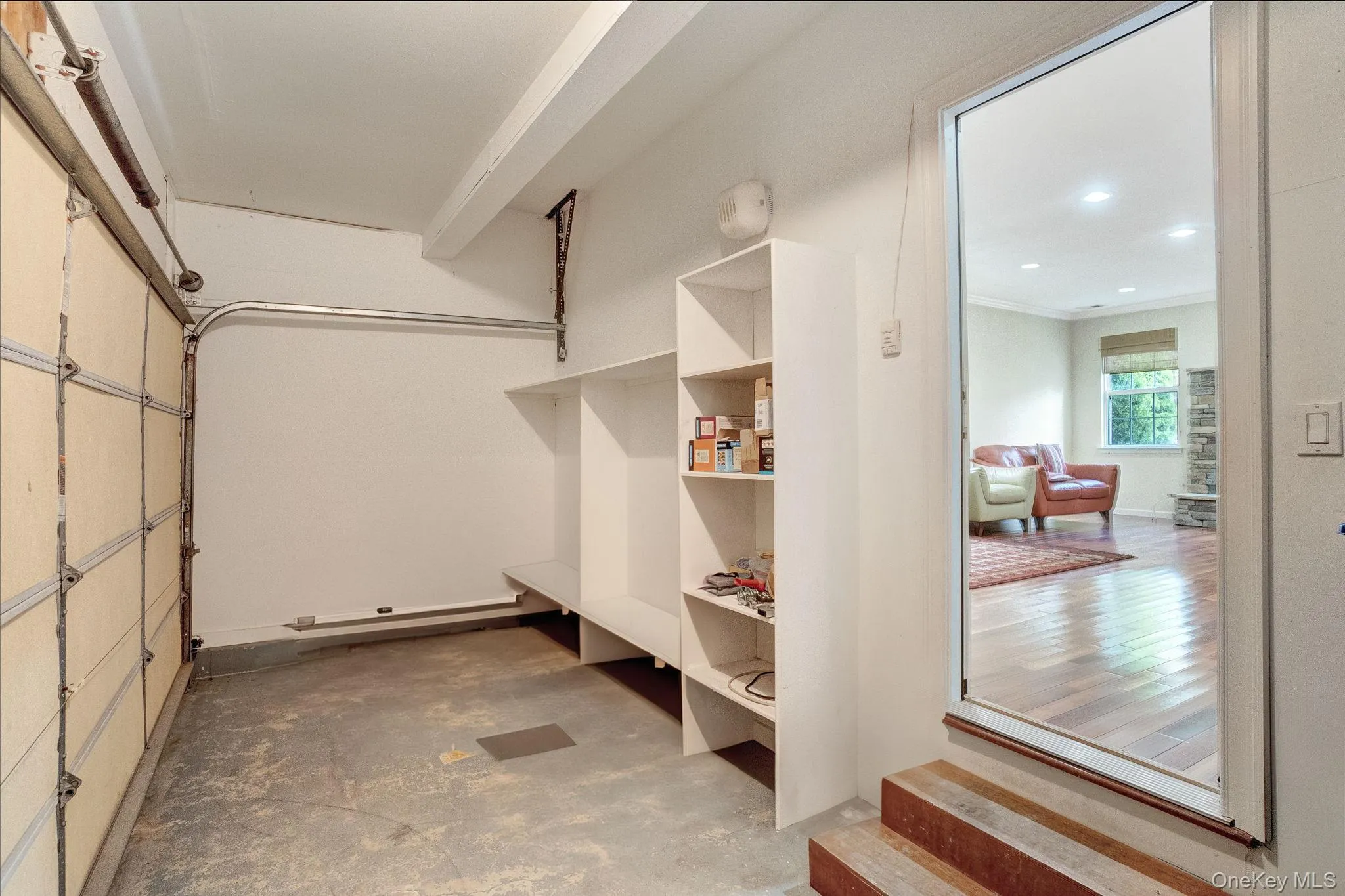 Mudroom featuring concrete floors and recessed lighting Mudroom featuring concrete floors and recessed lighting