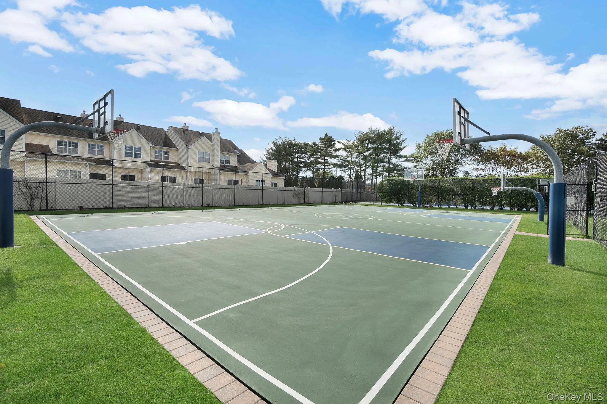 View of sport court featuring community basketball court View of sport court featuring community basketball court