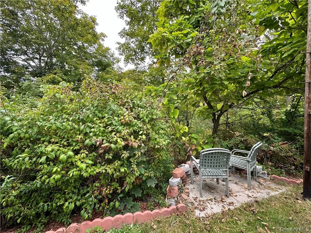 View of yard featuring a patio area View of yard featuring a patio area
