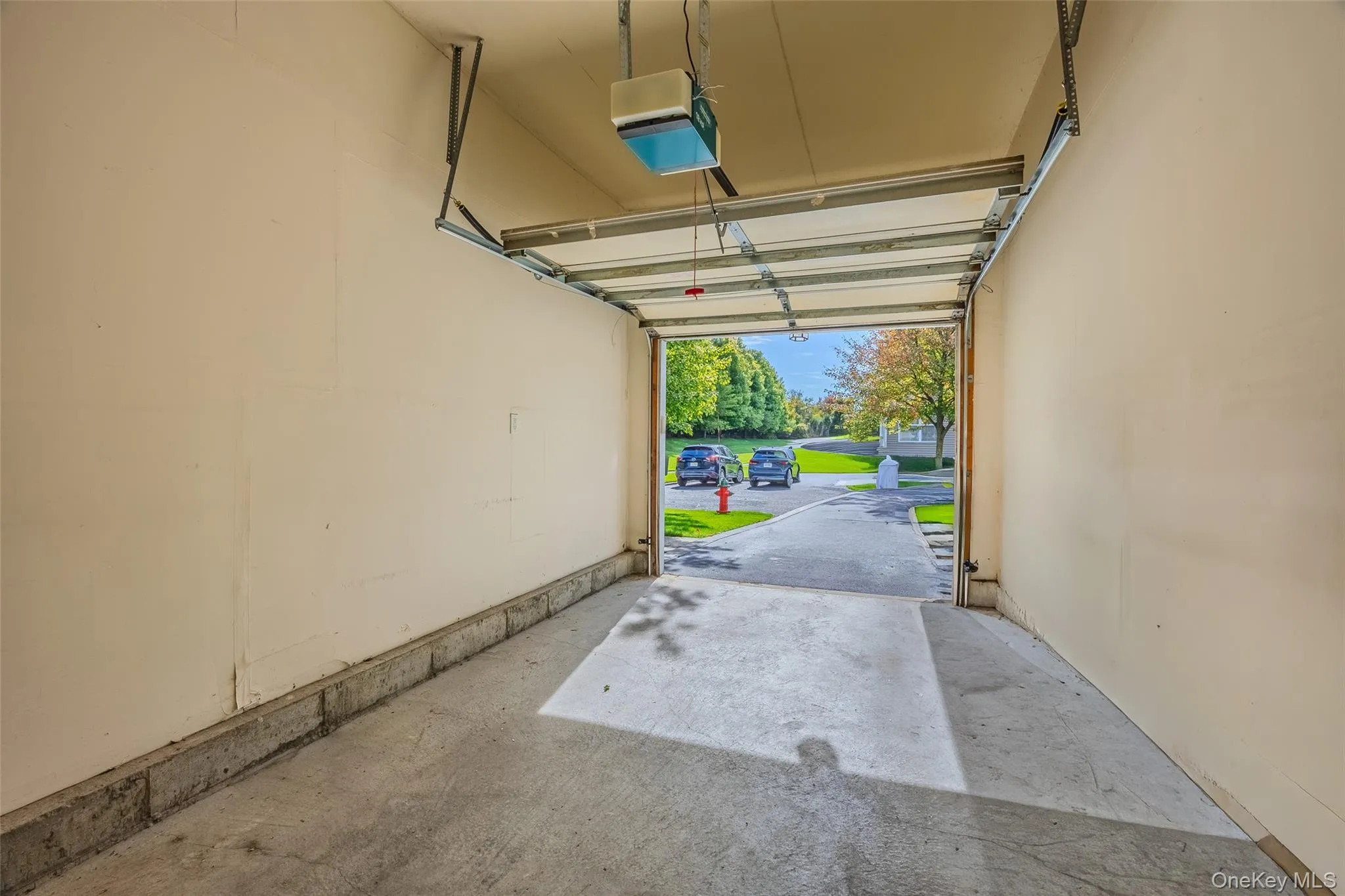 Garage with a garage door opener Garage with a garage door opener