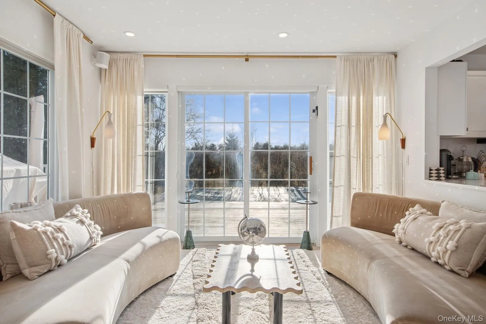 Living room featuring healthy amount of natural light Living room featuring healthy amount of natural light