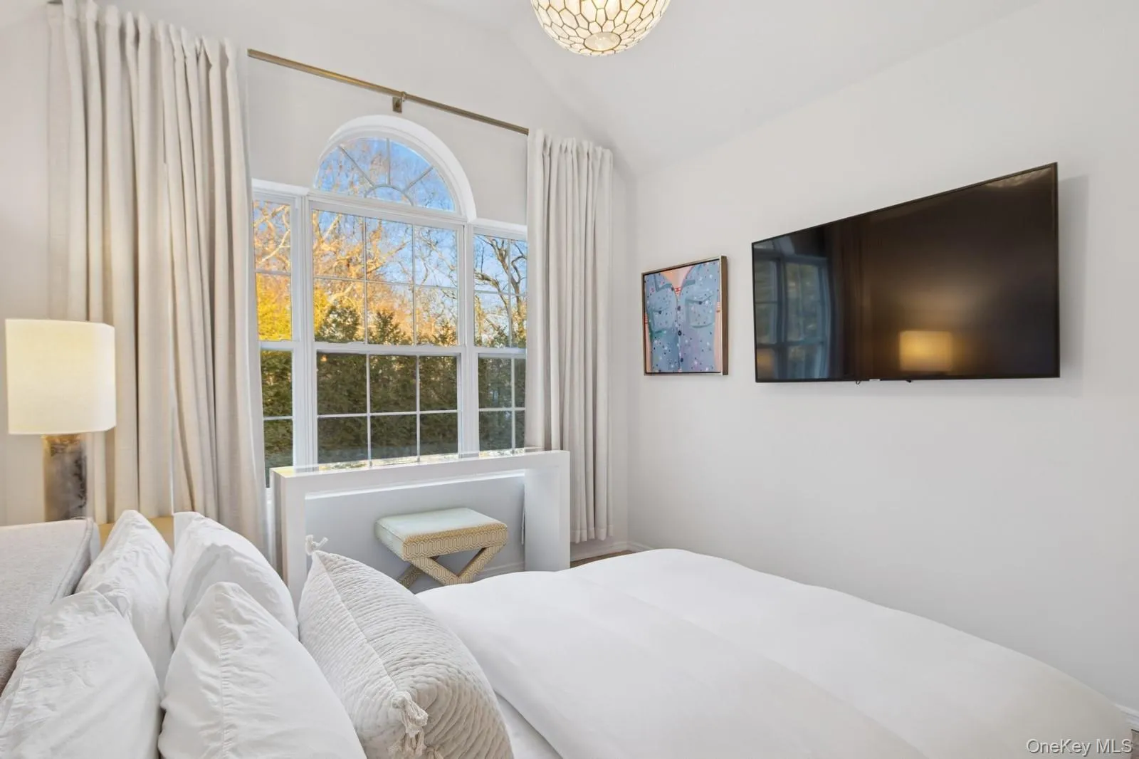 Bedroom with lofted ceiling Bedroom with lofted ceiling