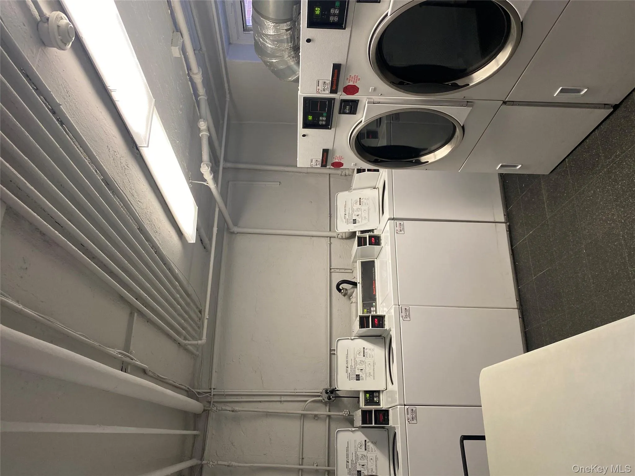 Laundry room featuring washing machine and dryer Laundry room featuring washing machine and dryer