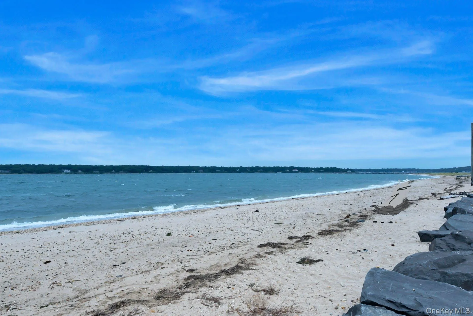 Water view featuring nearby beach Water view featuring nearby beach