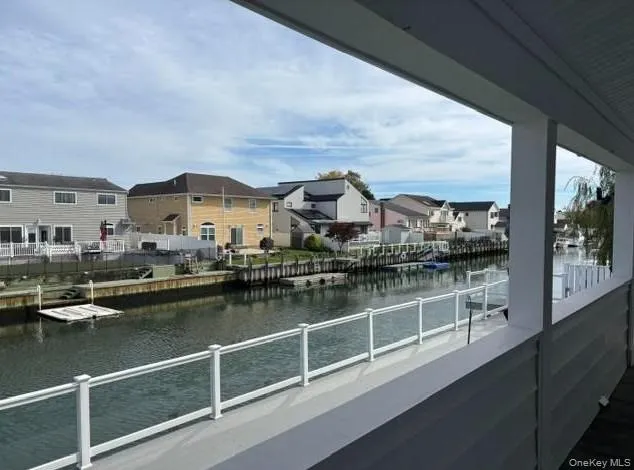 Water view with nearby suburban area Water view with nearby suburban area