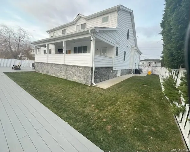 View of home's exterior with a fenced backyard View of home's exterior with a fenced backyard