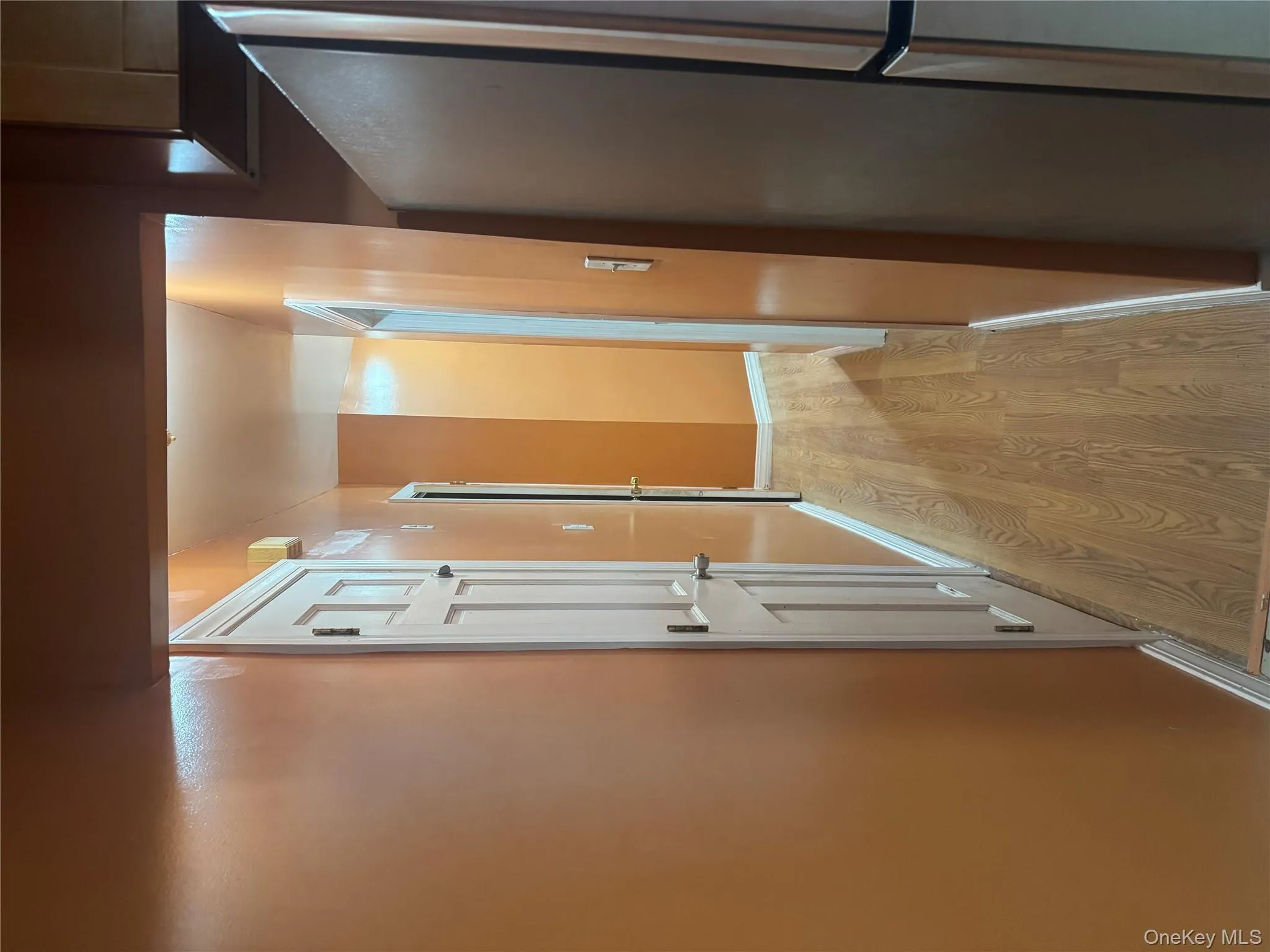 Corridor with light wood-type flooring and baseboards Corridor with light wood-type flooring and baseboards