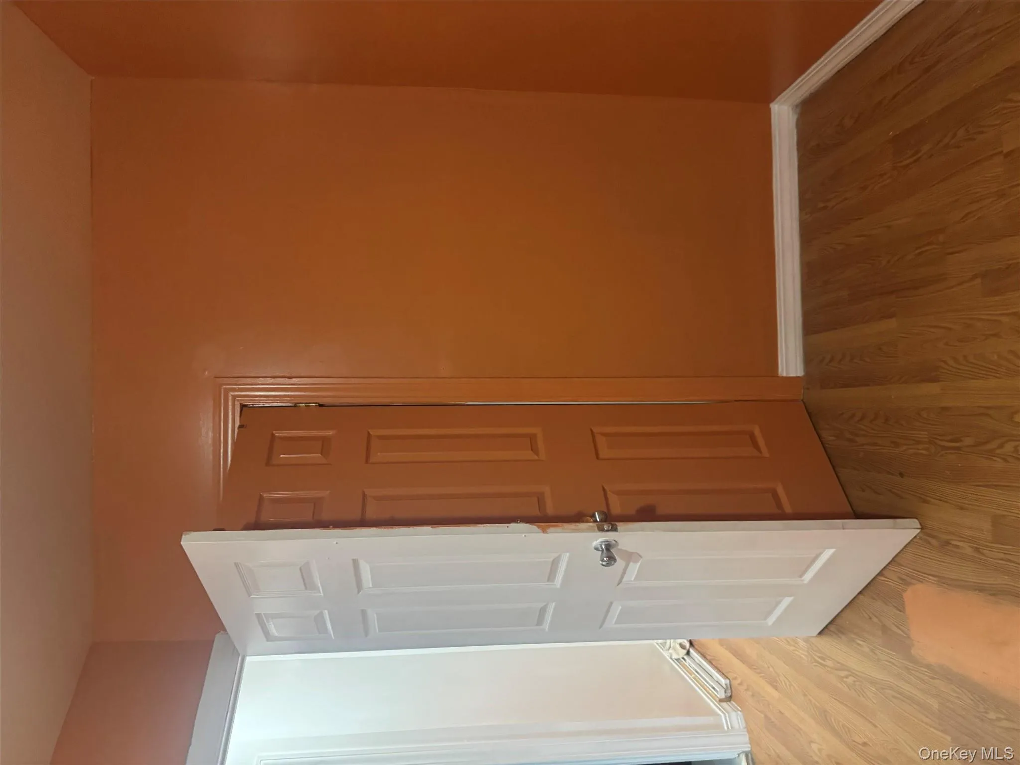 Unfurnished room with light wood-style floors and baseboards Unfurnished room with light wood-style floors and baseboards