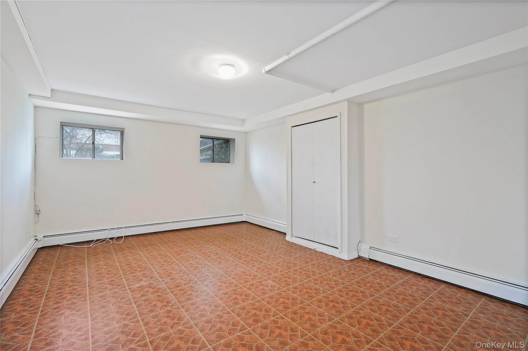 Lower level bedroom with closet Lower level bedroom with closet