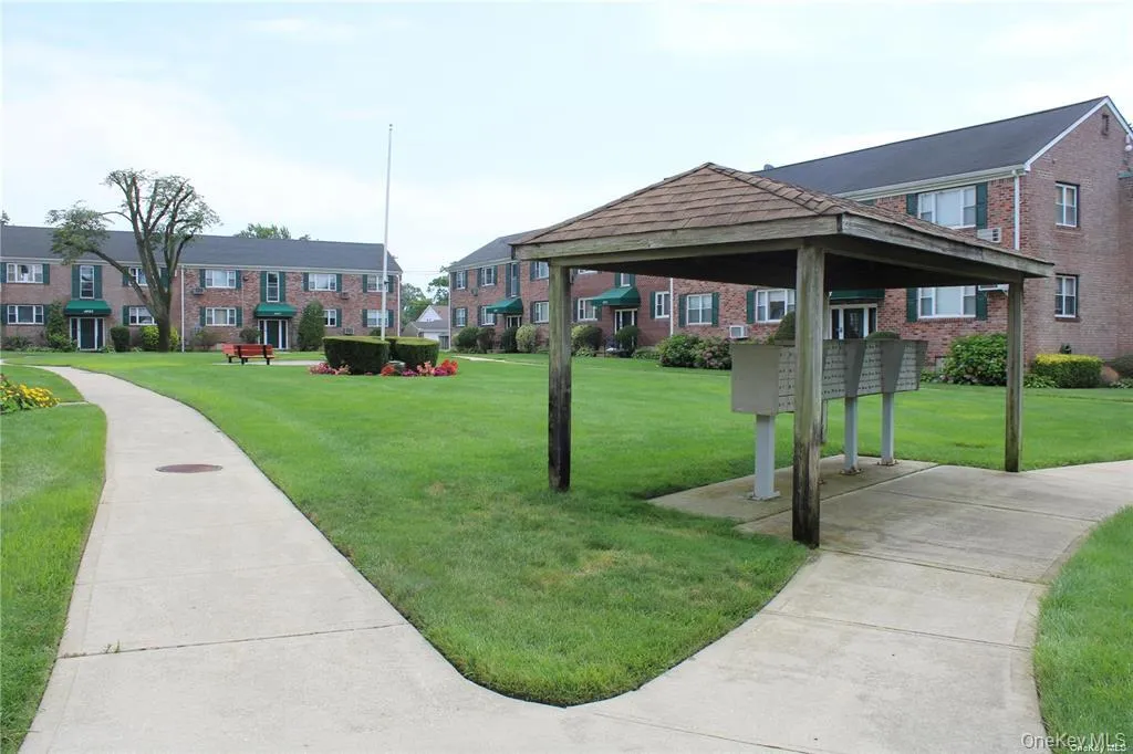 View of community with mail area, a lawn, a residential view, and a gazebo View of community with mail area, a lawn, a residential view, and a gazebo