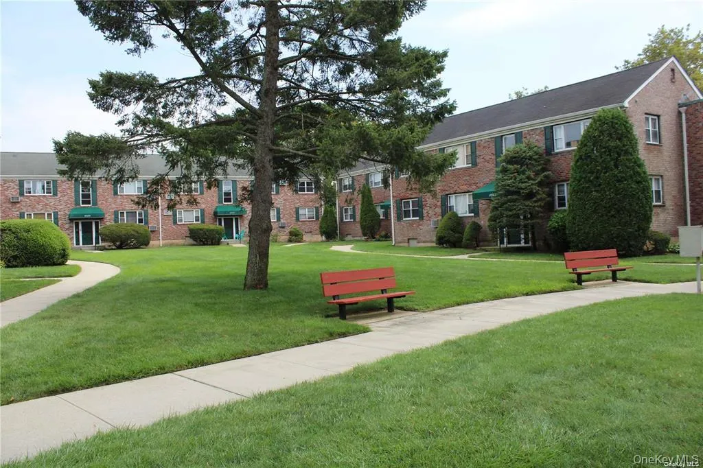View of community featuring a lawn View of community featuring a lawn