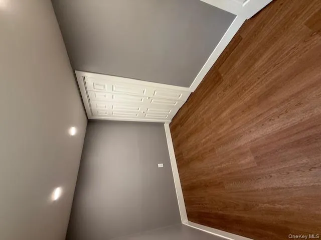 Unfurnished bedroom featuring a closet, wood finished floors, and recessed lighting Unfurnished bedroom featuring a closet, wood finished floors, and recessed lighting