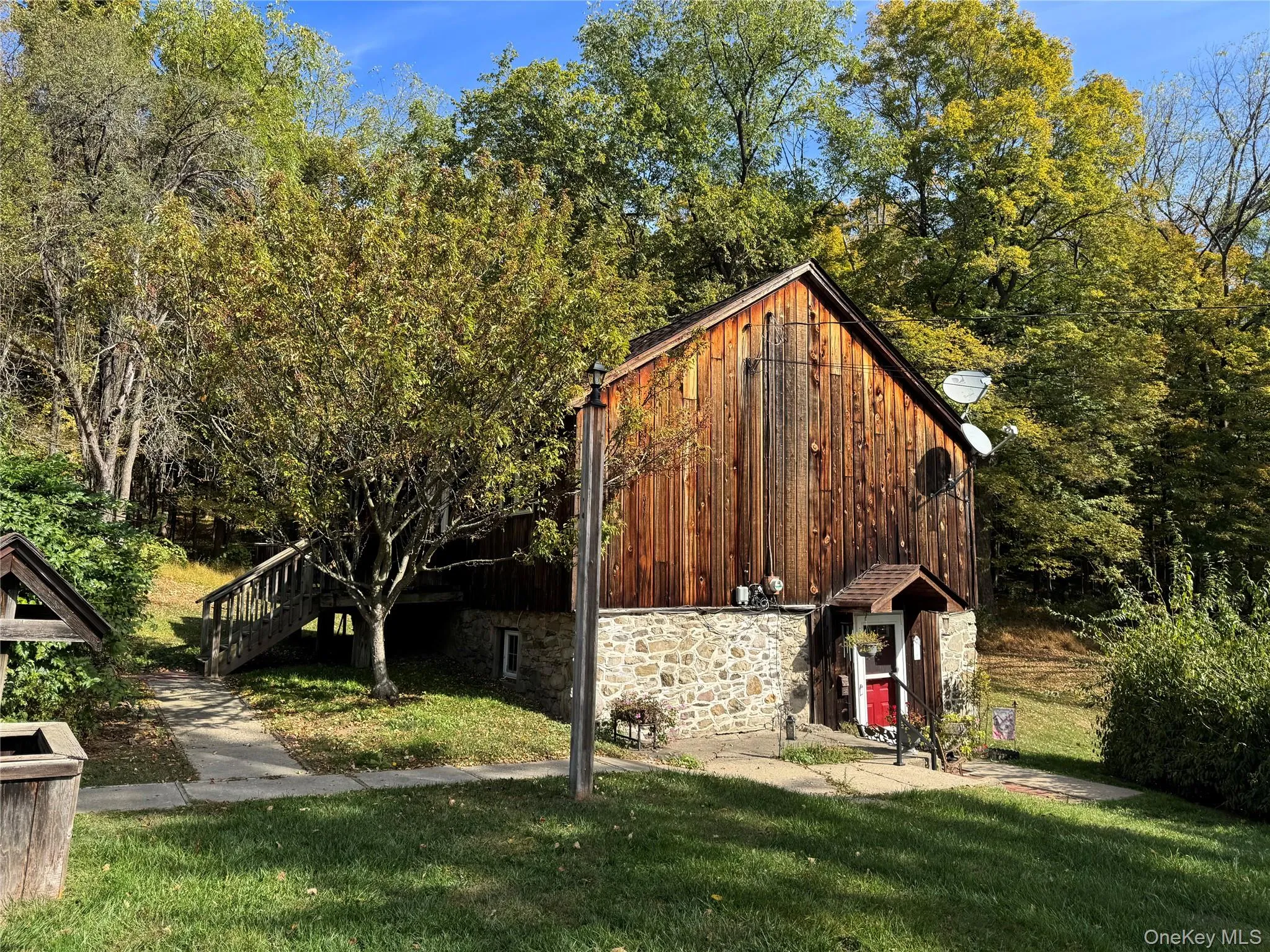 View of outdoor structure with stairs and a forest view View of outdoor structure with stairs and a forest view