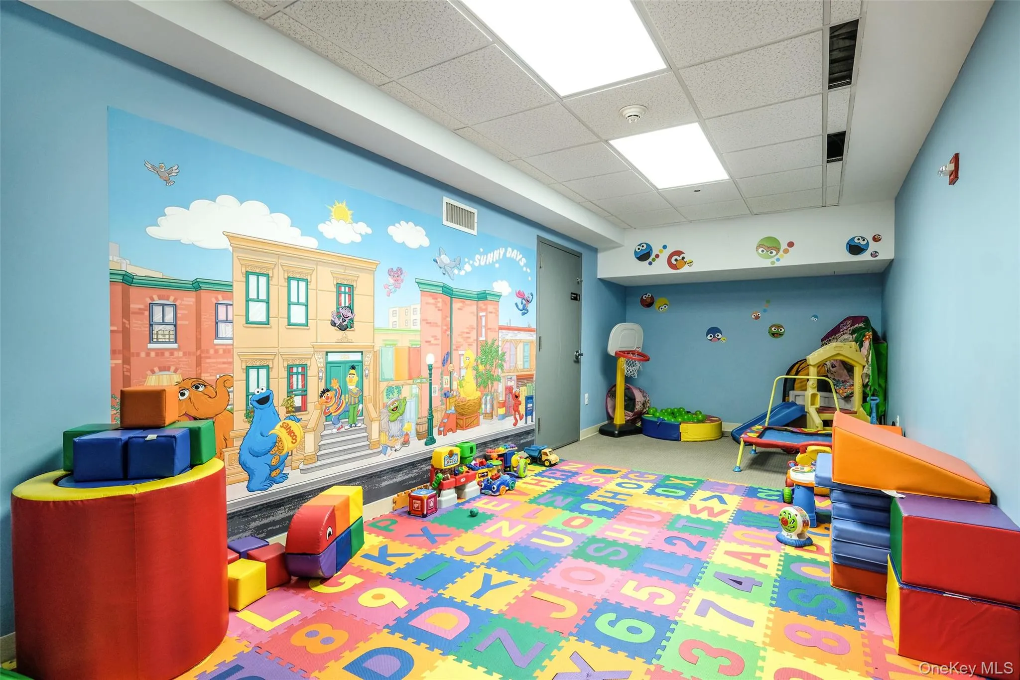 Rec room with a paneled ceiling Rec room with a paneled ceiling