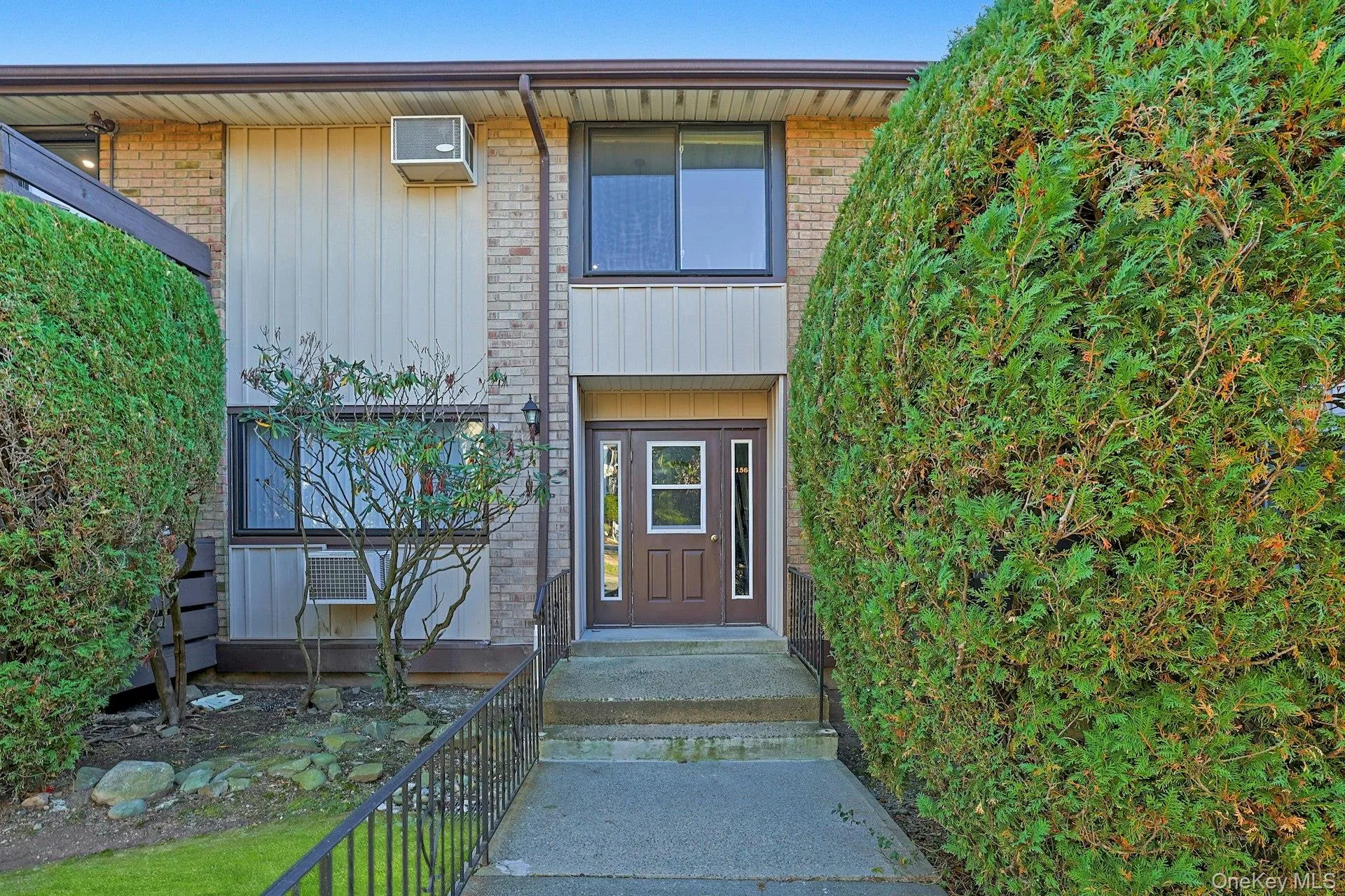View of exterior entry with brick siding View of exterior entry with brick siding