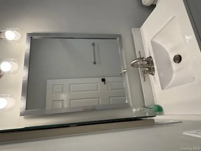 Bathroom featuring vanity Bathroom featuring vanity