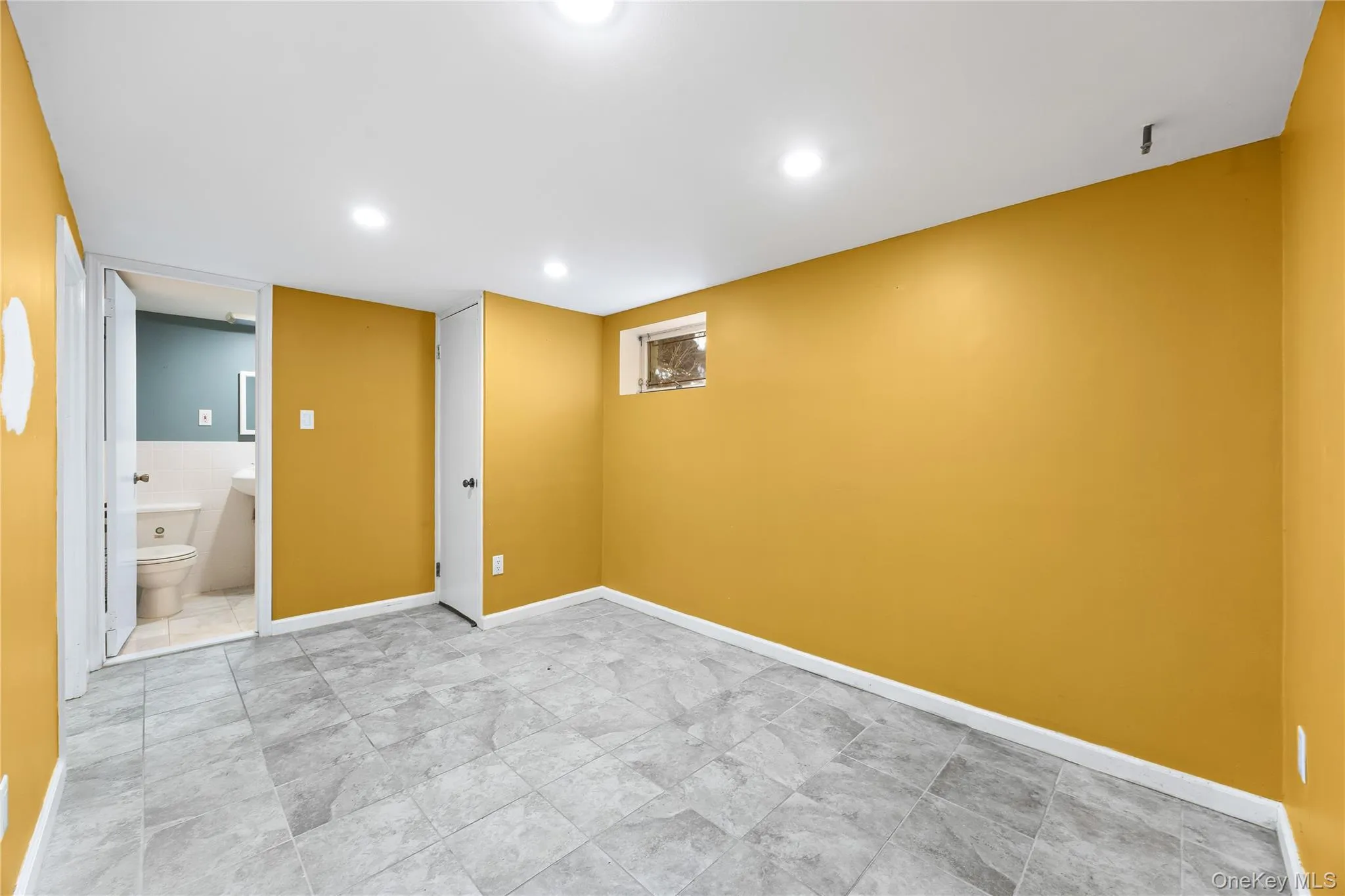 Basement with baseboards and recessed lighting Basement with baseboards and recessed lighting