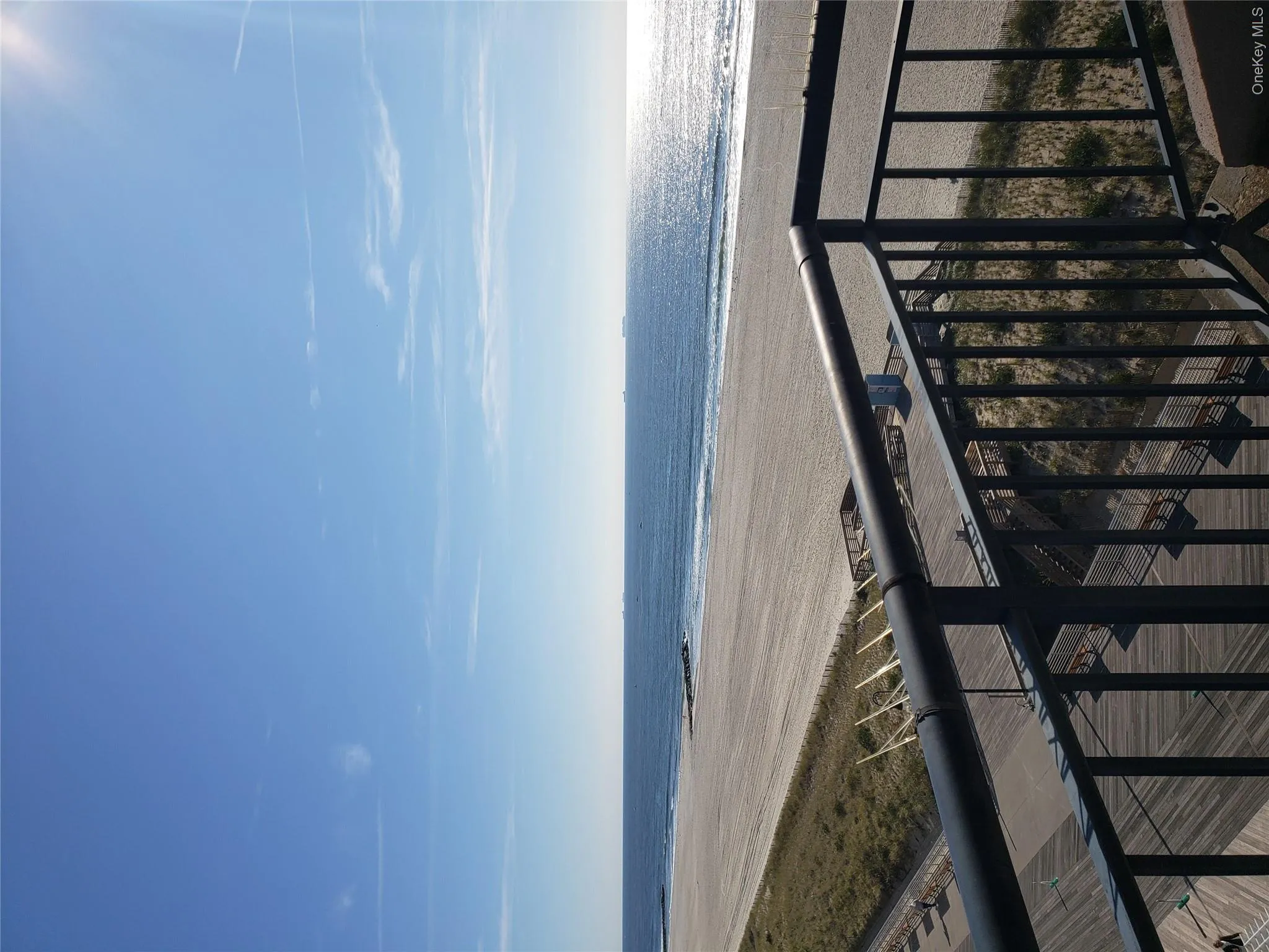Water view featuring nearby beach Water view featuring nearby beach