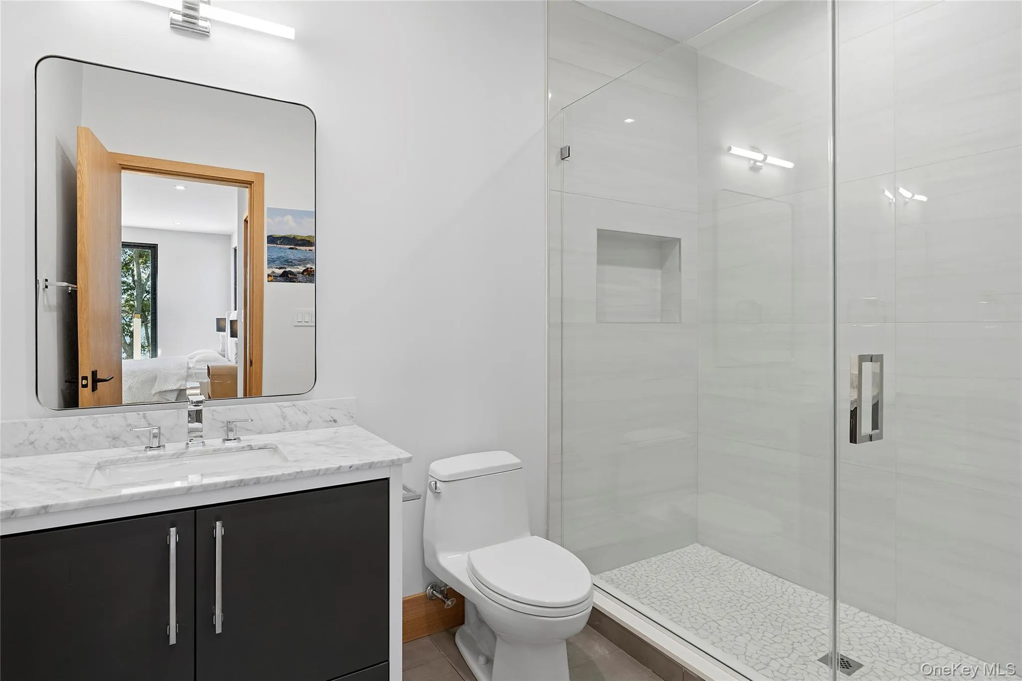 Ensuite bathroom with vanity and a stall shower Ensuite bathroom with vanity and a stall shower