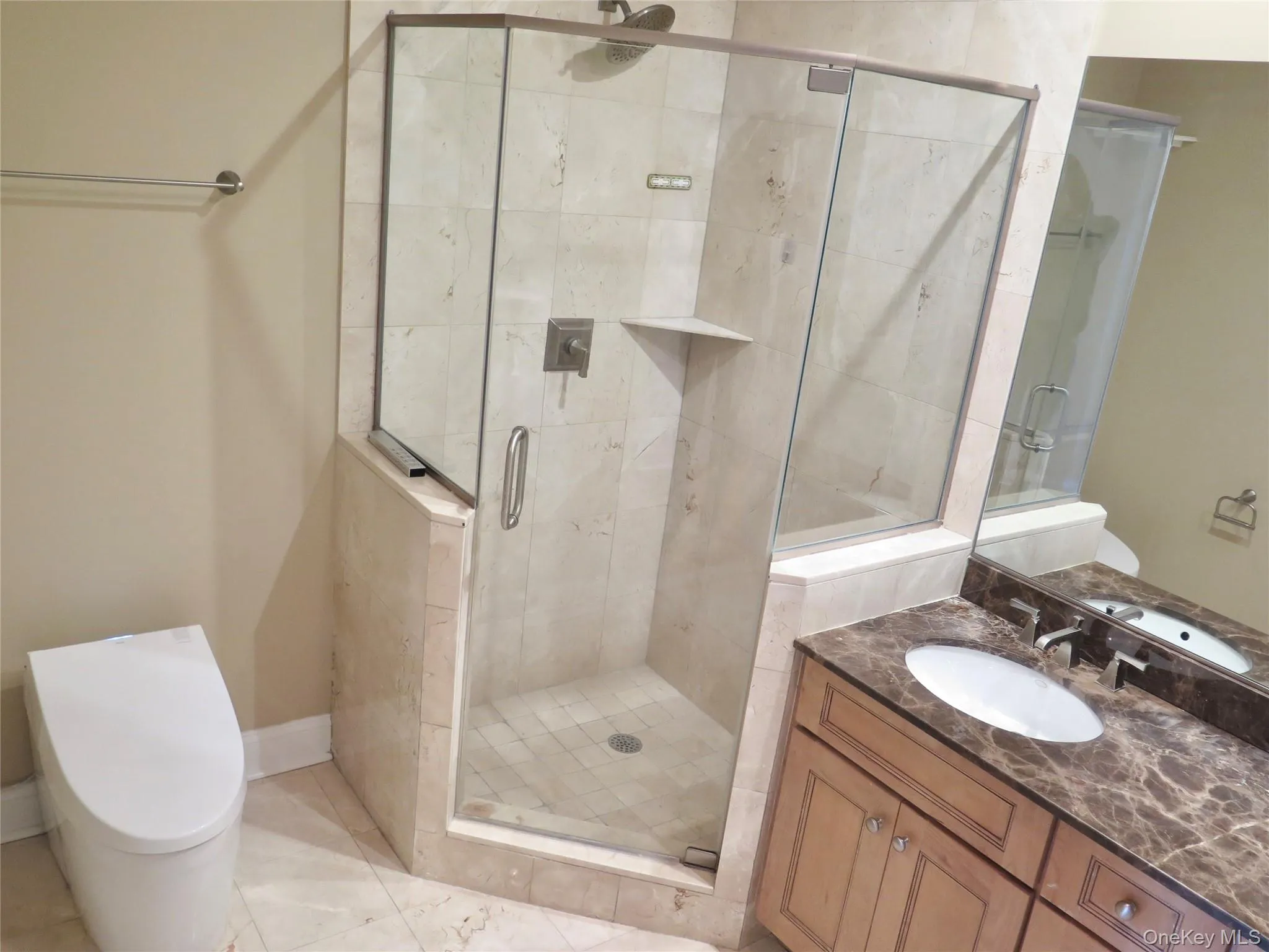 Ensuite Bathroom featuring double vanity and a stall shower Ensuite Bathroom featuring double vanity and a stall shower