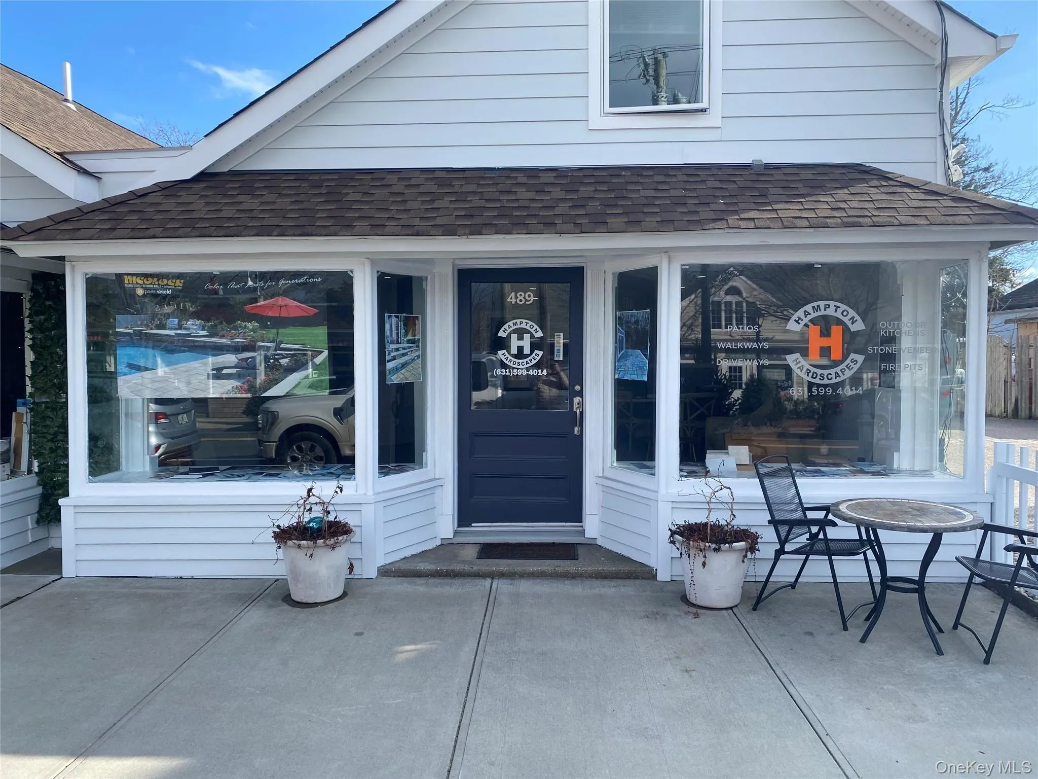 Entrance to property with a shingled roof Entrance to property with a shingled roof