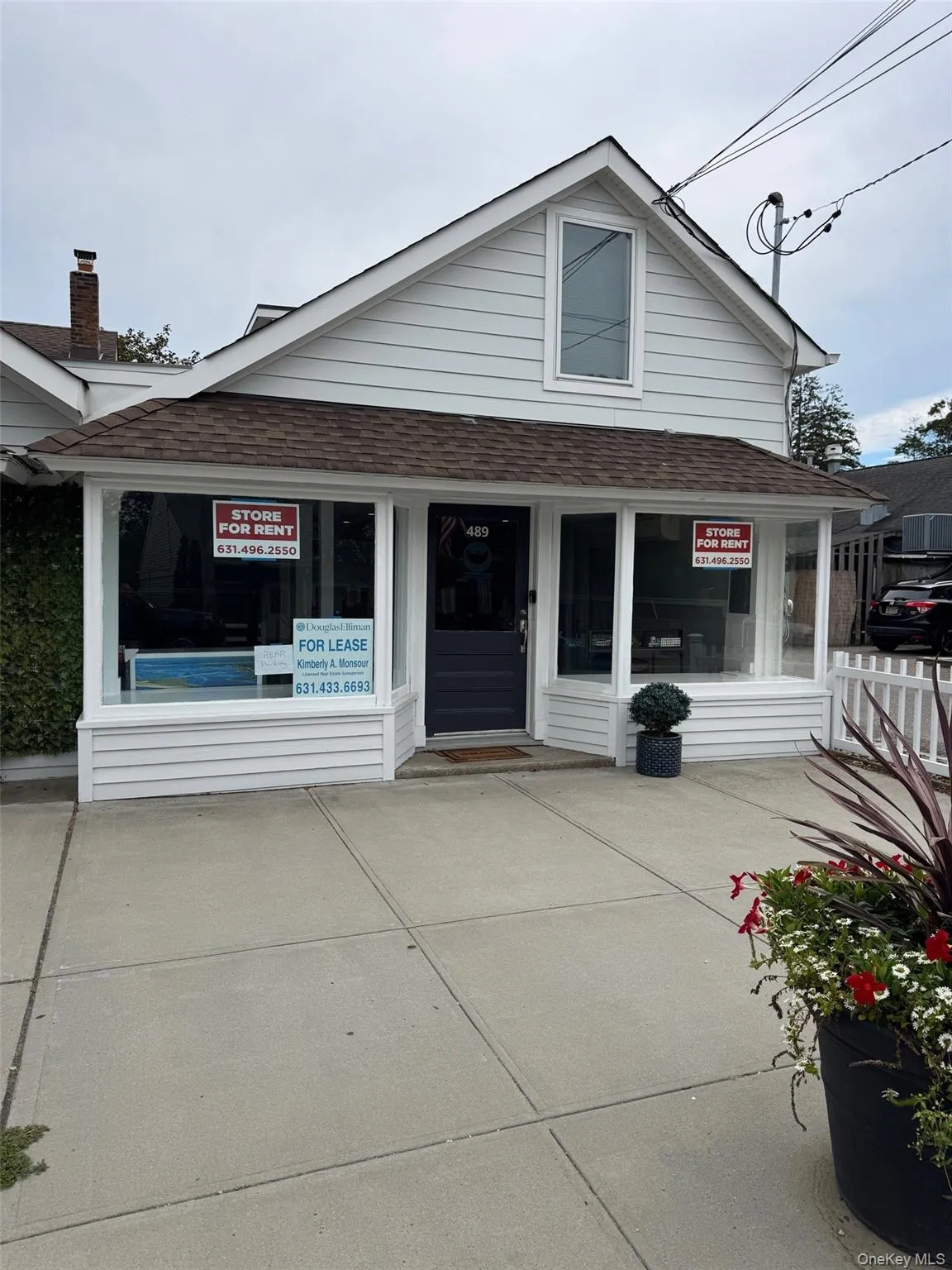 View of front of house featuring a shingled roof View of front of house featuring a shingled roof