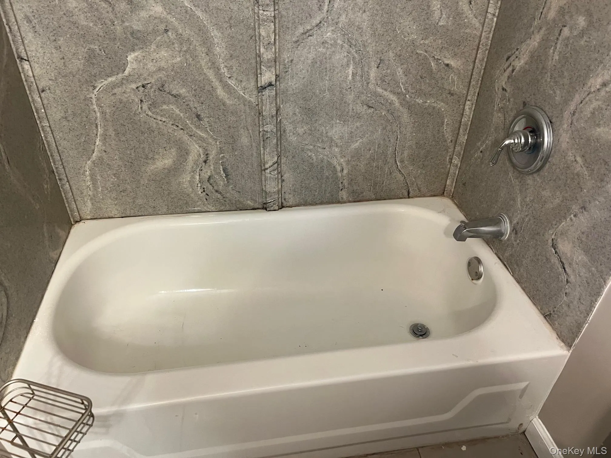 Full bathroom with a bathtub Full bathroom with a bathtub