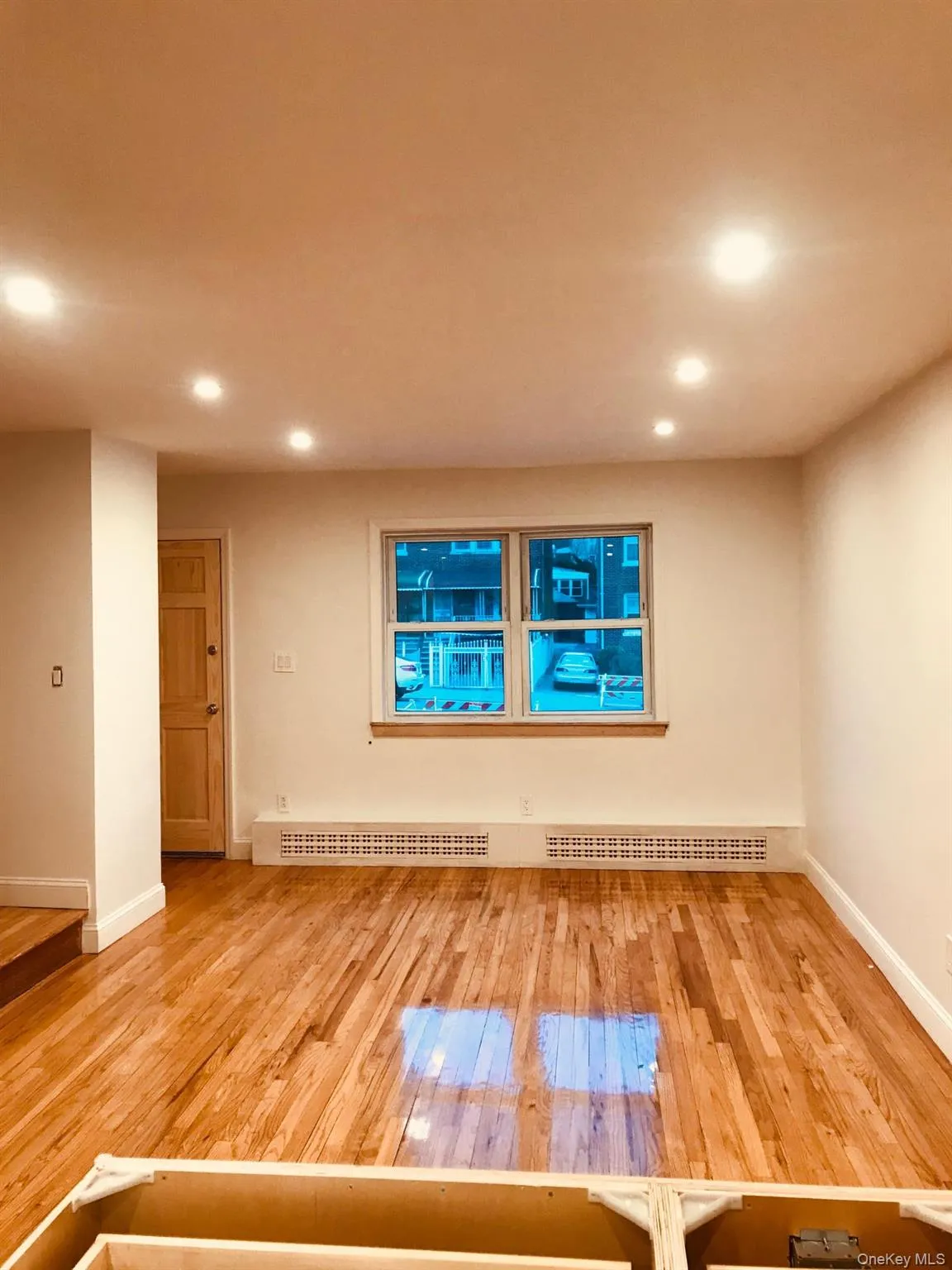 Empty room featuring light wood-style flooring and recessed lighting Empty room featuring light wood-style flooring and recessed lighting