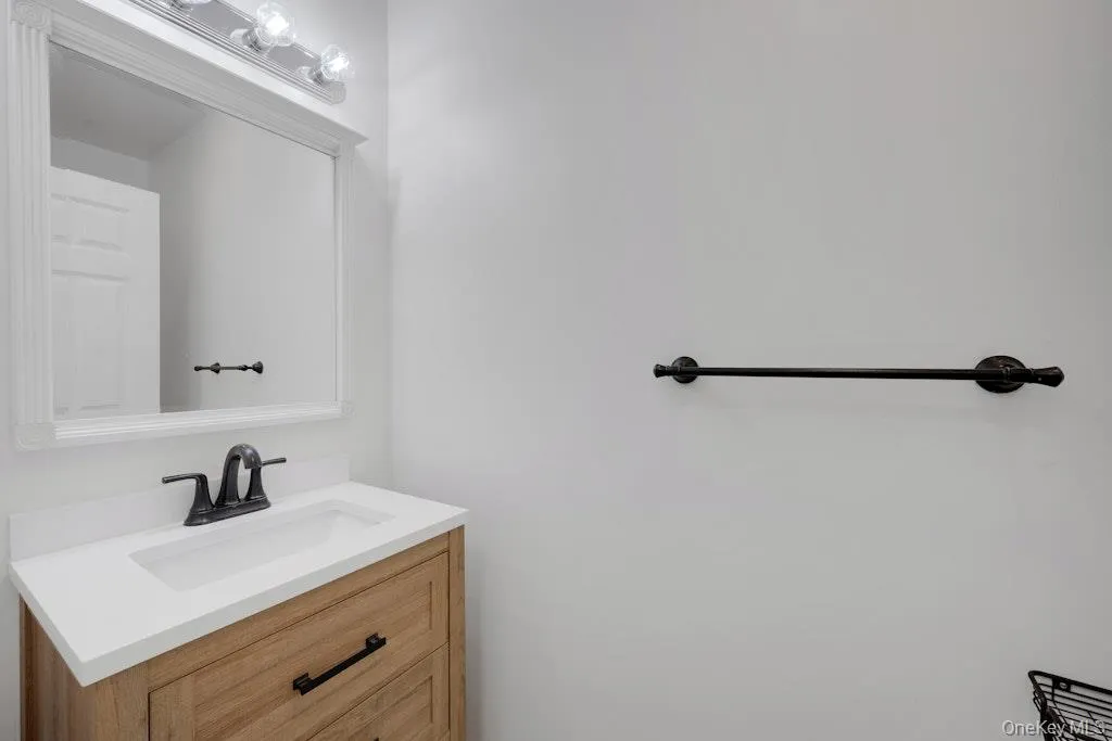 Bathroom featuring vanity Bathroom featuring vanity