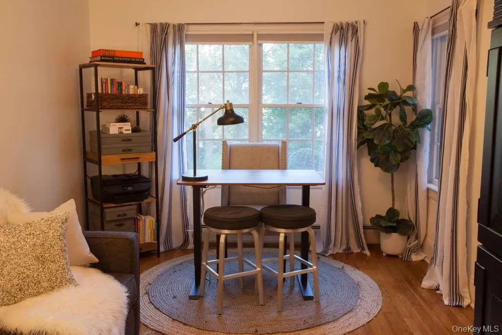 Dining room featuring wood finished floors Dining room featuring wood finished floors