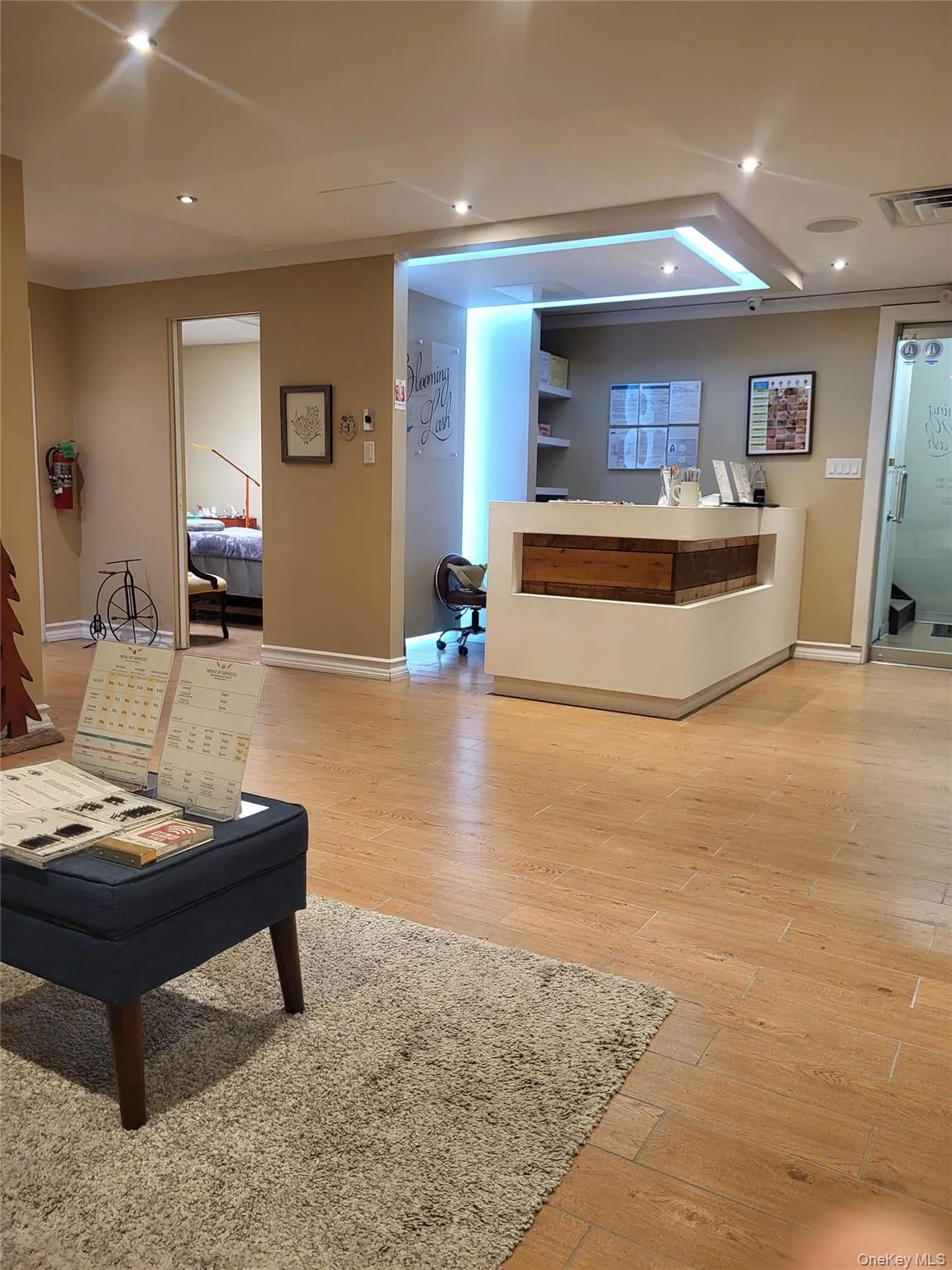 Reception area featuring recessed lighting and crown molding Reception area featuring recessed lighting and crown molding